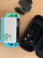 Nintendo Switch Animal Crossing Edition + Zubehör und 6 Spielen Hessen - Lich Vorschau