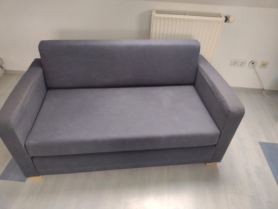 Ikea Sofa mit Schlaffunktion und Kissen in Stegaurach