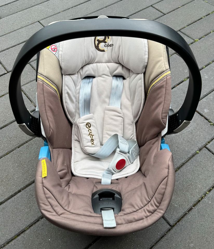 Babyschale Cybex Aton 3 mit Isofix Base 2-fix und Baumwollbezug in Meckenheim