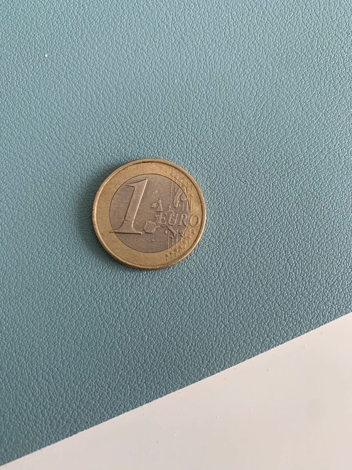 1€ Münze mit Eule in Hamburg