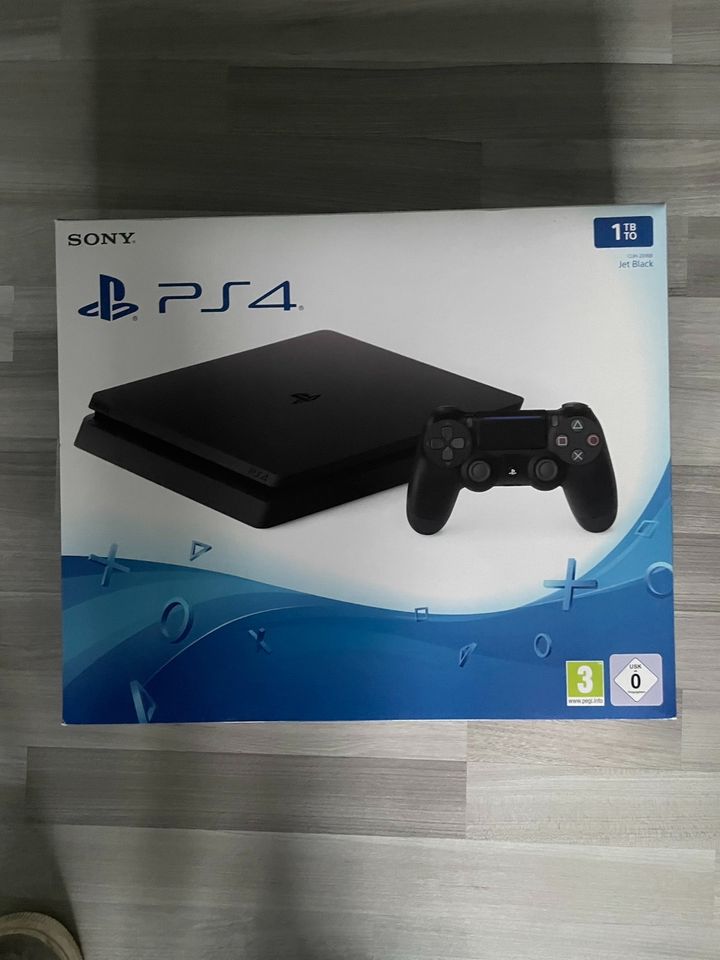 Sony PlayStation 4 Slim 1TB + Spiele in Versmold