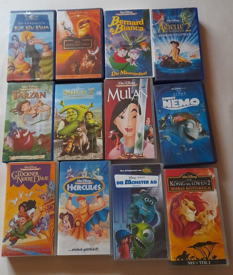 Disney Filme auf VHS - 12 Disney Klassiker - Neu in Köln