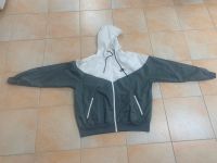 NIKE WINDBREAKER SPORTSWEAR GR: L FARBE:  GRAU/WEISS Sachsen - Leisnig Vorschau