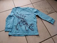 Shirt mit T-Rex Gr. 122 von Topolino Mecklenburg-Strelitz - Landkreis - Neustrelitz Vorschau