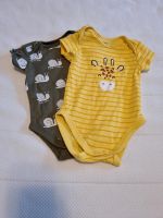 2 Babybodies mit kurzem Arm Gr. 68 (C&A) Nordrhein-Westfalen - Hilden Vorschau