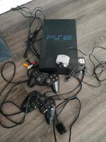 Playstation 2 mit 2 Controllern und 7 Spielen Sachsen-Anhalt - Calbe (Saale) Vorschau