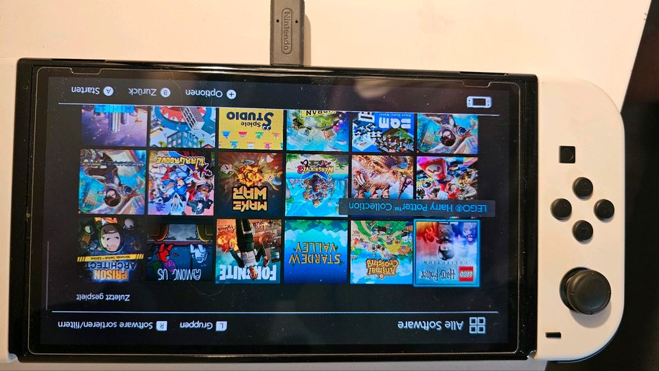 Nintendo Switch OLED inkl 42 Spiele und Zubehör in Königsbrunn