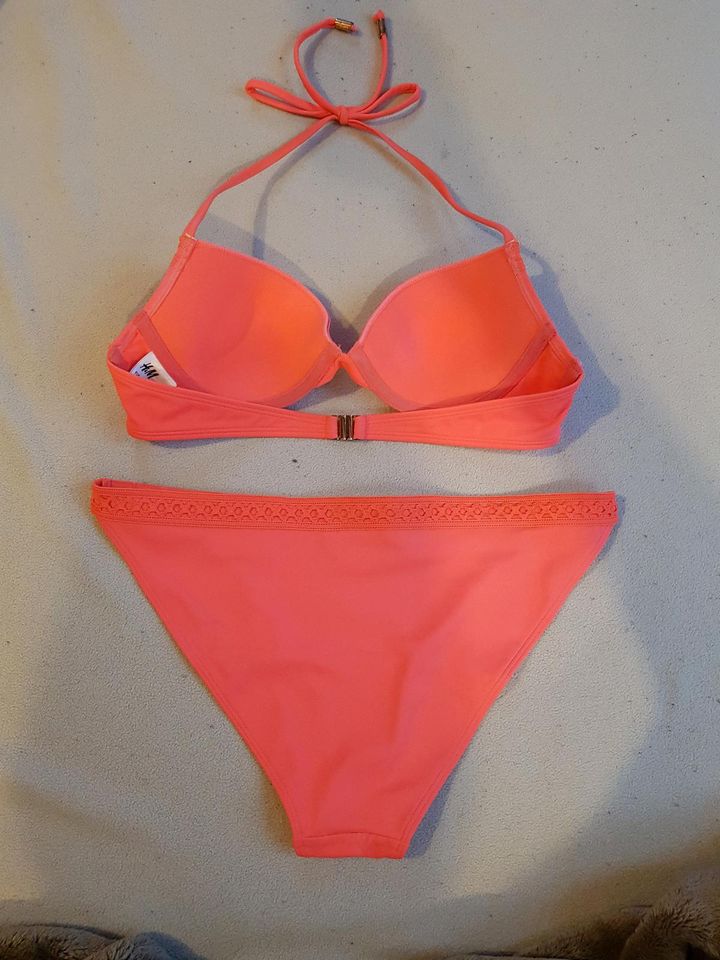 Neuwertig! Orange Bikini, Bikinihose M/38, Oberteil 75A in Lübeck