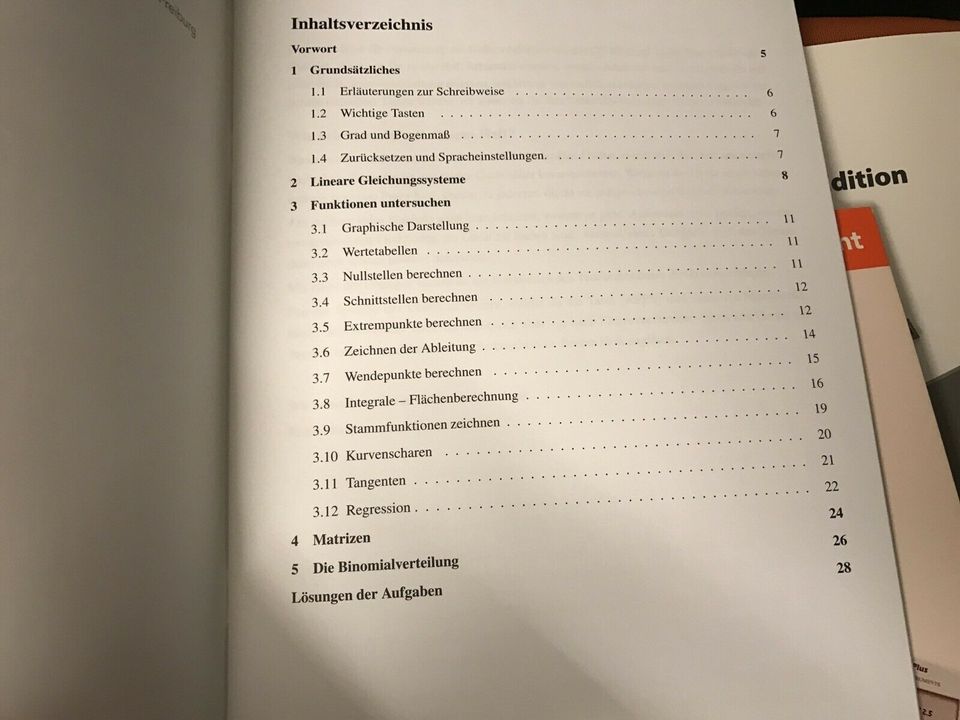 TI 84-PLUS mit Zubehör und zwei Übungsheften in Freiburg im Breisgau