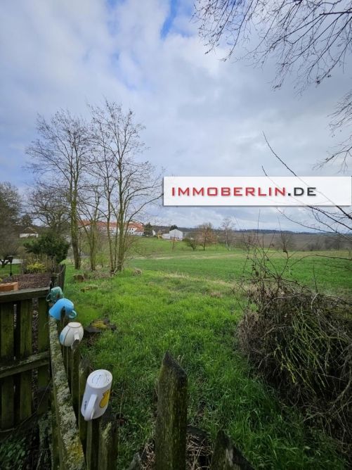 IMMOBERLIN.DE - Schönes Einfamilienhaus auf großzügigem Grundstück in ländlicher Lage in Buckow (Märkische Schweiz)