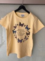Mädchen Shirt gelb mit Schmetterlinge Gr 134/140 Bayern - Innernzell Vorschau