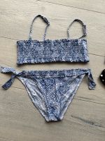 Bikini Calzedonia Gr 152 blau/weiß geblümt gesmoktes Oberteil Nordrhein-Westfalen - Dinslaken Vorschau