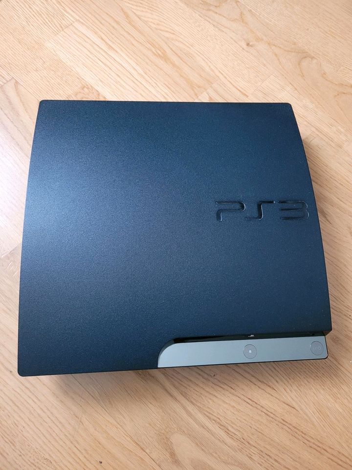 PS3 Konsole mit 2 Controllern inkl. 10 Spiele in Unterschleißheim