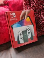 Nintendo Switch OLED-Modell HEG-001 64GB Handheld-Spielekonsole Sachsen-Anhalt - Lutherstadt Wittenberg Vorschau