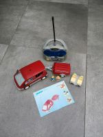 Fernsteuerbares rotes Playmobil Auto mit Anhänger und Fernsteueru Niedersachsen - Winsen (Luhe) Vorschau