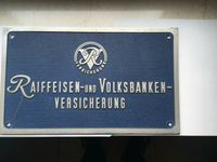 Werbeschild Raiffeisen und Volksbank Versicherungen Rheinland-Pfalz - Ilbesheim bei Landau in der Pfalz Vorschau