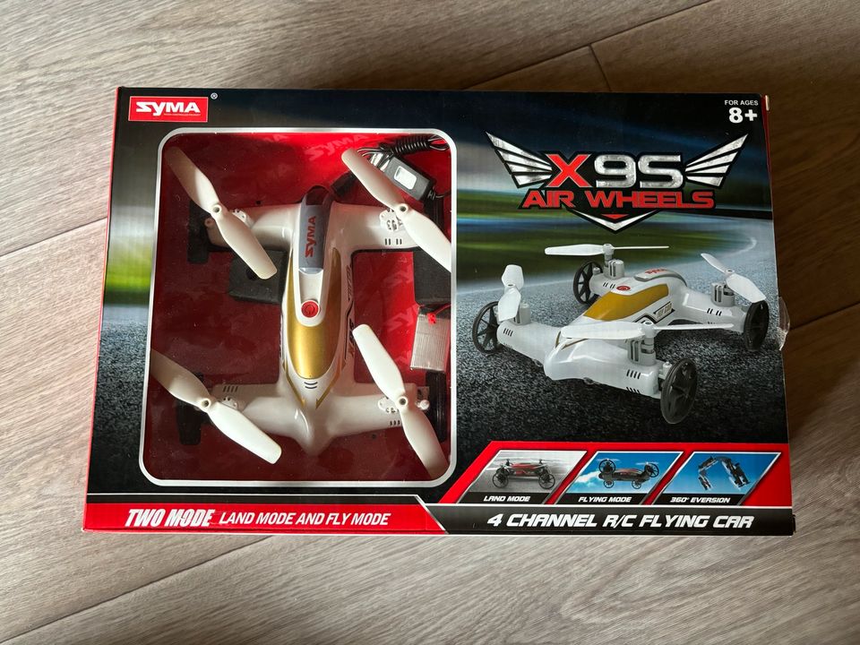 Syma X9S Air Wheels / fliegendes Spielzeugauto in Geesthacht