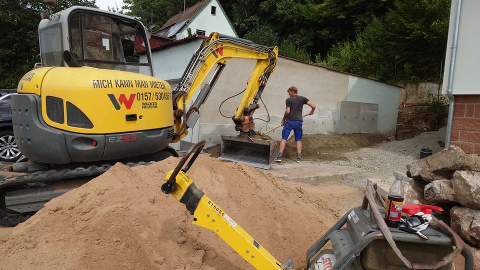 Baggerarbeiten, Erdaushub, Poolbau, Mauerscheibensteine, Arbeiten in Gräfendorf