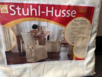 Stuhl-Husse beige 5 Stück Original verpackt Hessen - Butzbach Vorschau