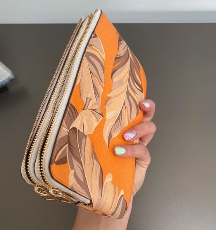 Coach Clutch Federn orange beige braun in Mannheim