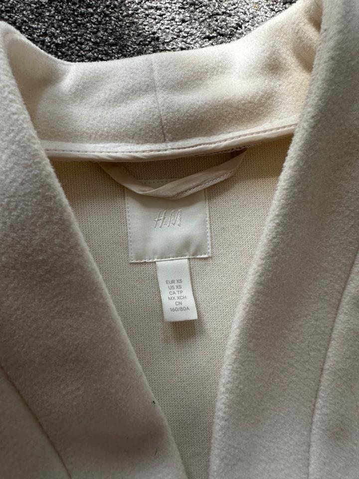 Elegante beigefarbene ärmellose Jacke, Mantel, Weste von H&M. in Meckenheim