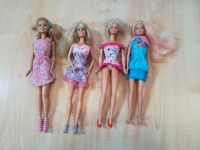 4 Barbie mit Anziehsachen, guter Zustand Herzogtum Lauenburg - Berkenthin Vorschau