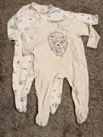Kleidungspaket 2x Baby-Schlafanzug mit Füsschem.C&A Gr. 74 Nordrhein-Westfalen - Kerpen Vorschau