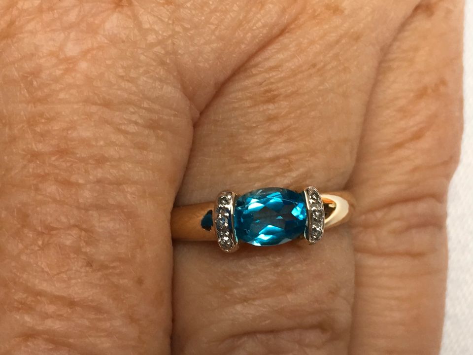 Goldring 585 mit Topas blau u 6 kleinen Diamanten in Kamp-Lintfort