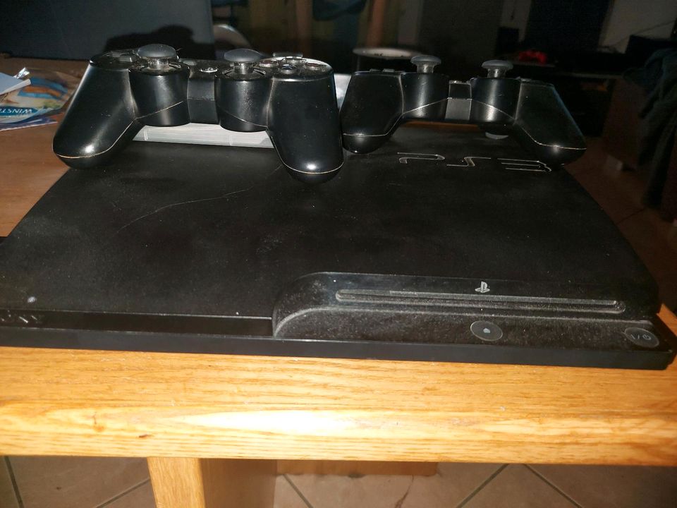 PS3 Slim 320GB  2 Controller  PS3 Spiele Diabolo, Devil May Cry, in Remchingen