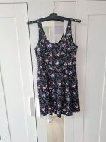 Schwarzes Kleid Größe 40 mit Blumen Muster H&M Stretch ärmellos Baden-Württemberg - Murrhardt Vorschau