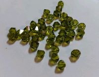 4 Tüten Swarovski ® Kristalle 4mm Doppelkegel olive grün Niedersachsen - Bockenem Vorschau