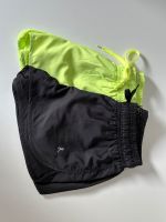 2 kurze Sporthosen Funktions-Shorts schwarz neon gelb grün XS 34 Frankfurt am Main - Ostend Vorschau