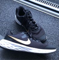 Nike Turnschuhe Gr.36 schwarz-Gold Baden-Württemberg - Sinsheim Vorschau