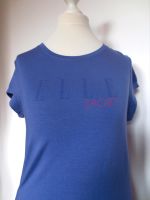 T-Shirt in lila mit Aufdruck und Details in rot von Elle Sport Hessen - Großenlüder Vorschau