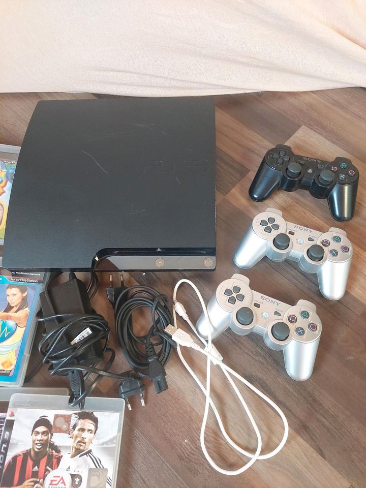 PS3 mit 26 Spielen und 3 Controller in Ispringen