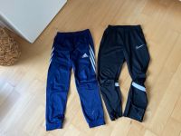 2 Trainingshosen Nike / Adidas Gr: 164 schwarz / blau Niedersachsen - Rosdorf Vorschau