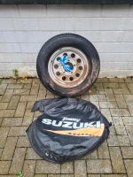 Suzuki Jimny Ersatzrad Ersatzreifen Heckklappenrad mit Tasche Nordrhein-Westfalen - Heiligenhaus Vorschau