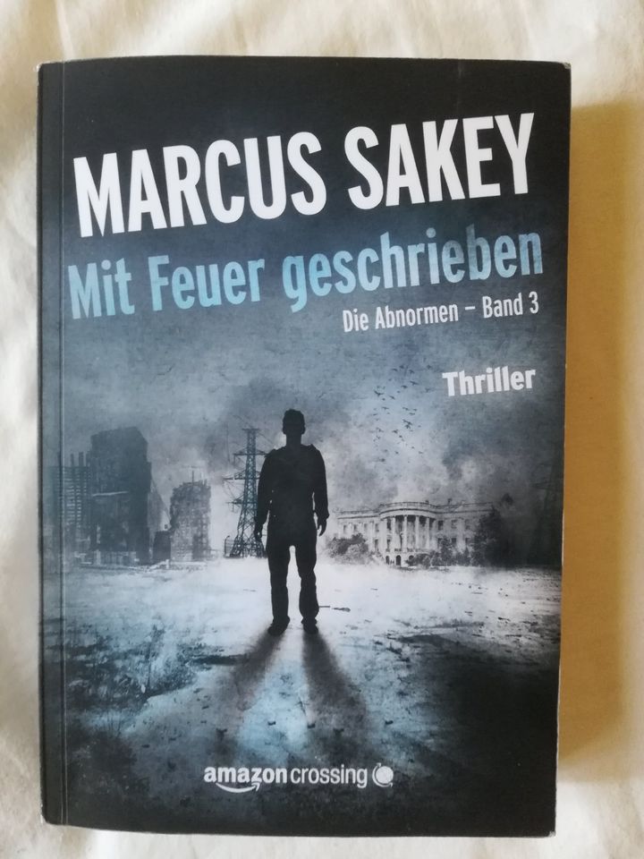 Marcus Sakey Die Abnormen Eine bessere Welt Mit Feuer geschrieben in Berlin