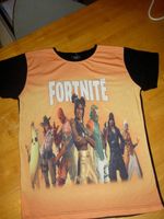 FORTNITE T-Shirt schwarz - orange mit Druck in Gr.140 - NEU Nordrhein-Westfalen - Lünen Vorschau