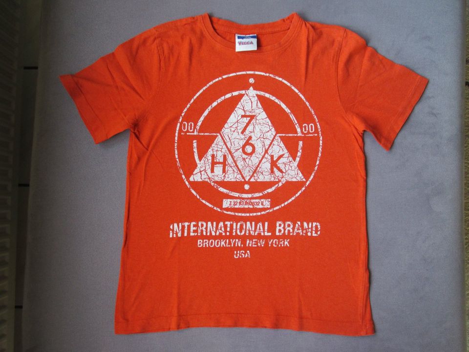 T-Shirt orange Gr. 134/140 - sehr gut erhalten in Geseke