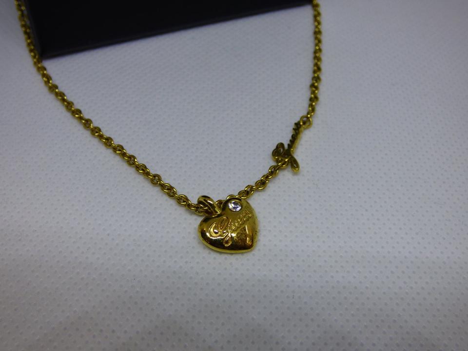 Guess Kette Herz gold mit Signature Schriftzug mit Box in Essen