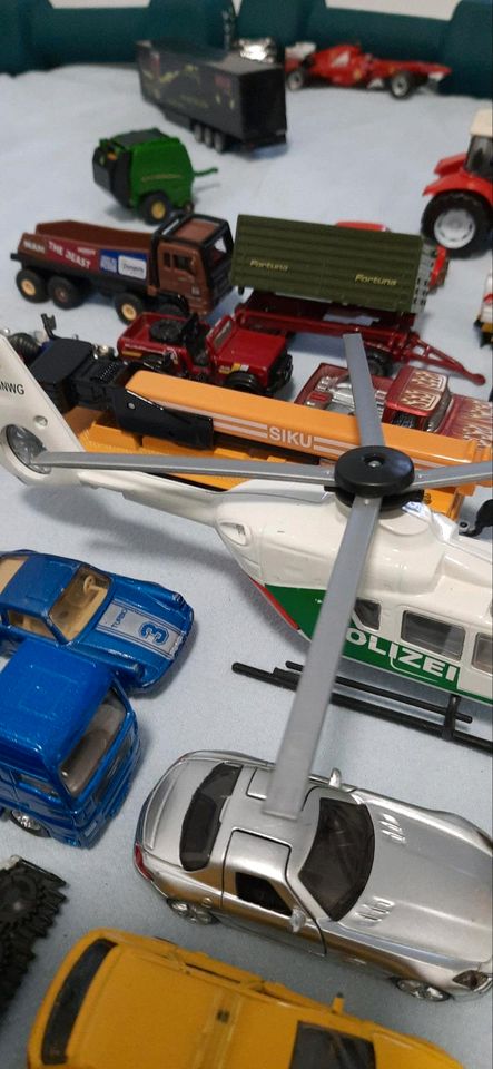Über 125 Siku,  Matchbox Spielzeugautos Konvolut in Dillenburg