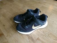 Nike Sportschuhe Sneaker schwarz Gold Größe 31 Nordrhein-Westfalen - Lage Vorschau