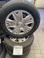 Ford - Winterreifen auf Stahlfelgen 205/60R 16  G8/50 Nordrhein-Westfalen - Troisdorf Vorschau