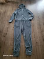 Kuscheliger Jumpsuit Overall Gr. 40-42 grau Niedersachsen - Velpke Vorschau
