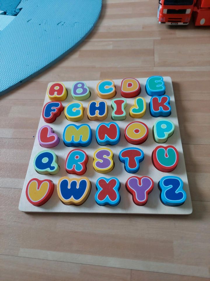 Holz Puzzle Buchstaben Spielzeug in Gievenbeck