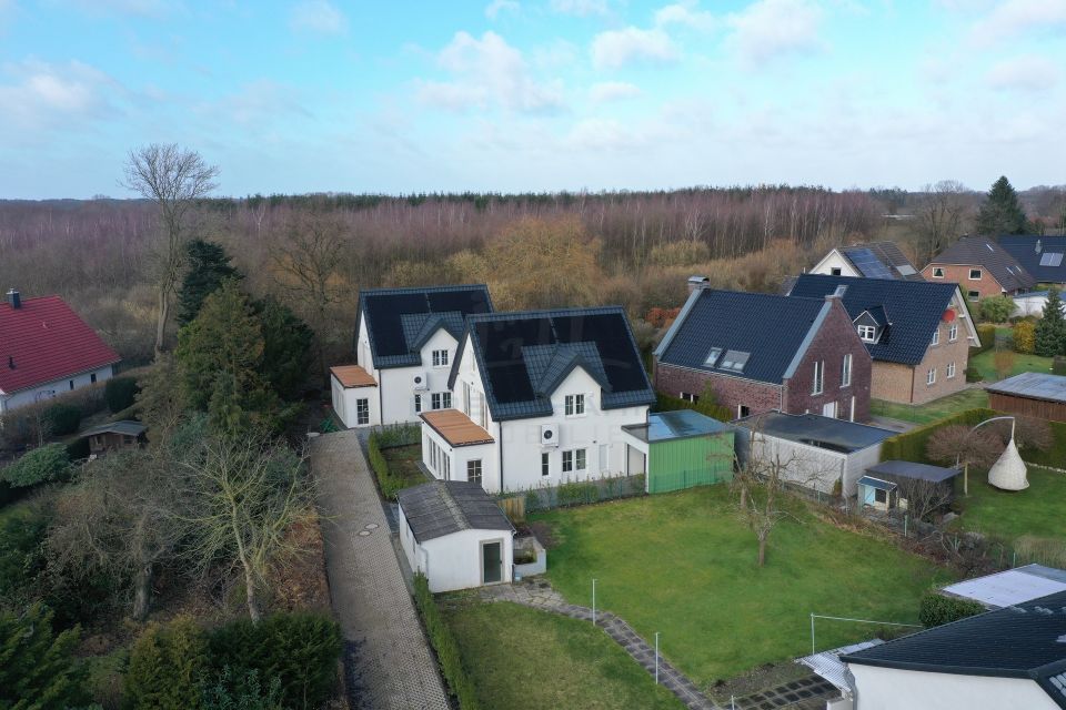 Moderne Wohnträume in Halstenbek: Erstklassiges Einfamilienhaus mit Terrasse und Garten in Halstenbek