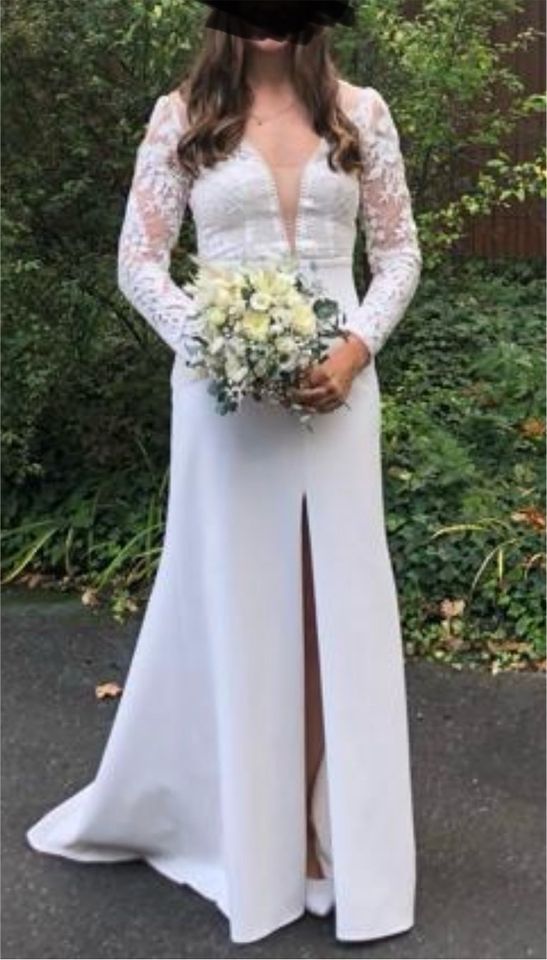 Elegantes Hochzeitskleid, Langarm und rückenfrei zu verkaufen in Schloß Holte-Stukenbrock