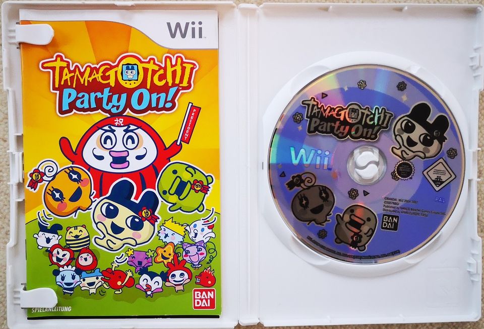 Nintendo Wii Spiel - Tamagotchi Party On! in Köln