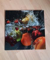 Glasbild 40x40 cm "Spritzendes Obst auf dem Wasser", neuwertig! Nordrhein-Westfalen - Lage Vorschau